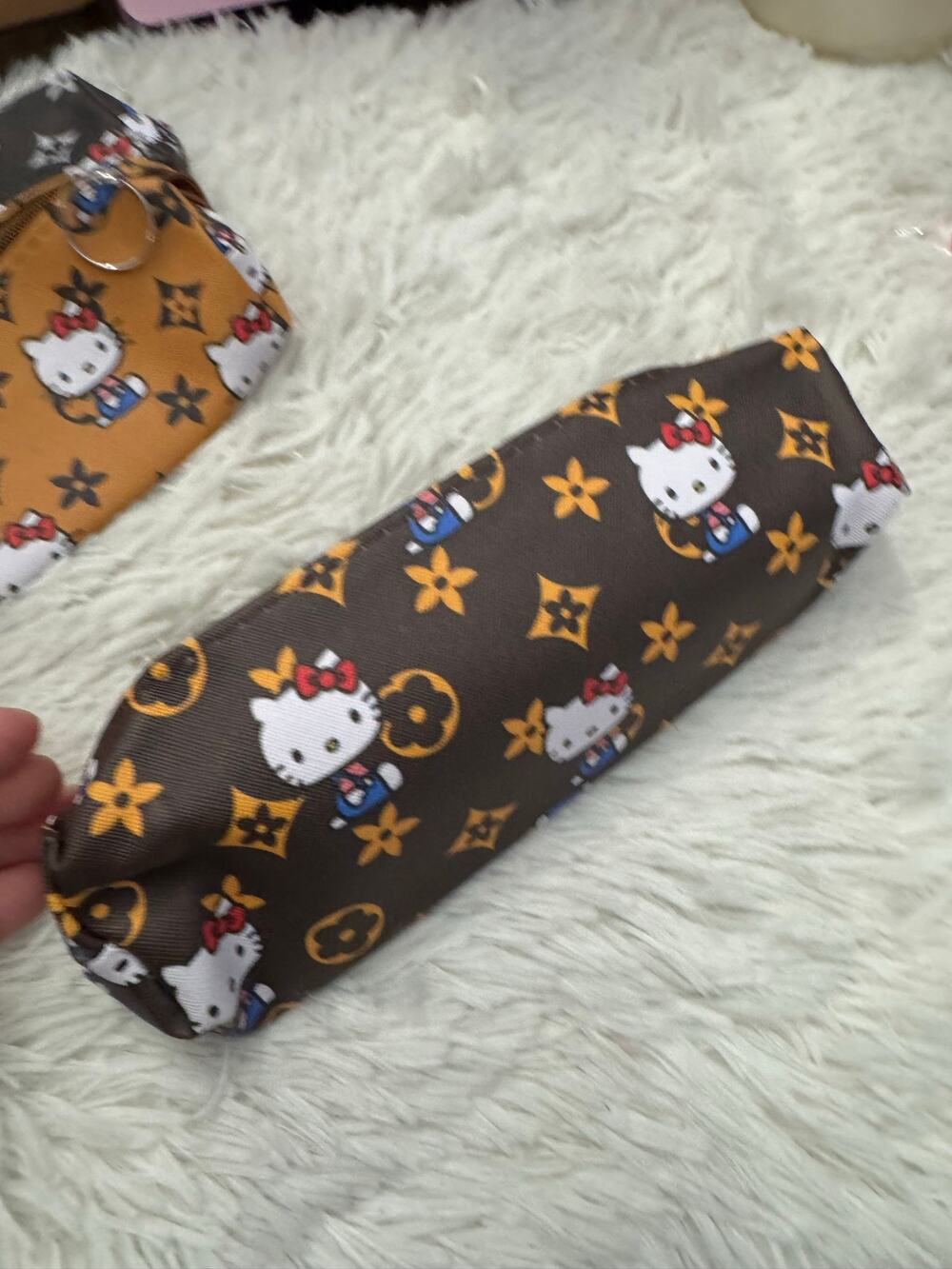 Hello Kitty fashion brown & yellow pencil case repeating  flower & star motifs
